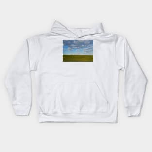 walking a green wheat field Kids Hoodie